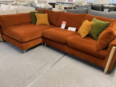 A Sunburst orange corner sofa