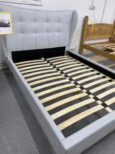 Double bed in light grey